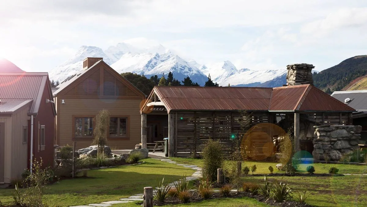 Camp Glenorchy eco retreat buildings beneath the mountains