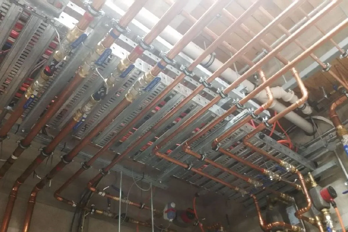 Extensive plumbing and heating pipework installed above the Camp Glenorchy ceiling