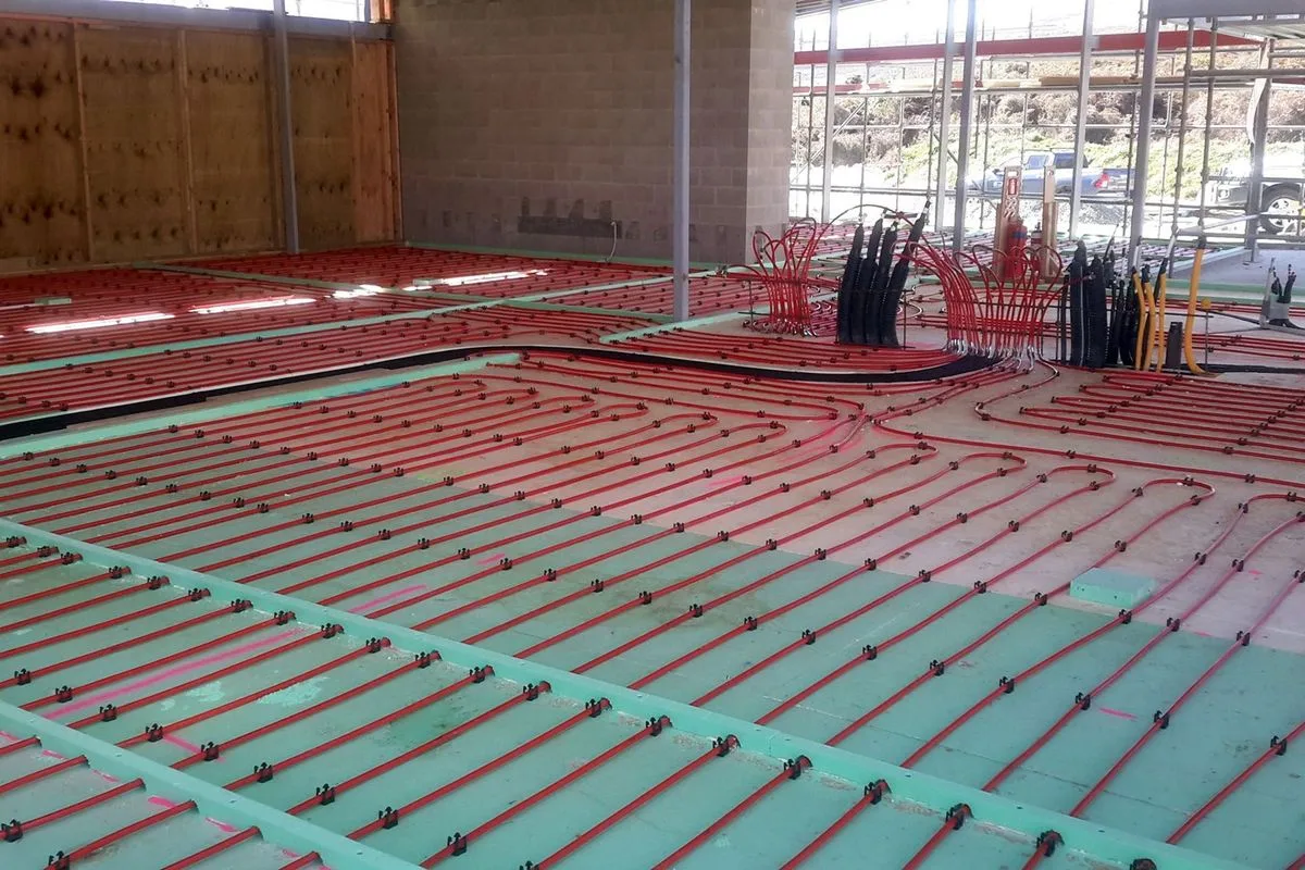 Zoned underfloor heating pipework during the Hidden Island build